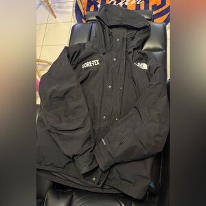 the north face black gtx mountain down jacket